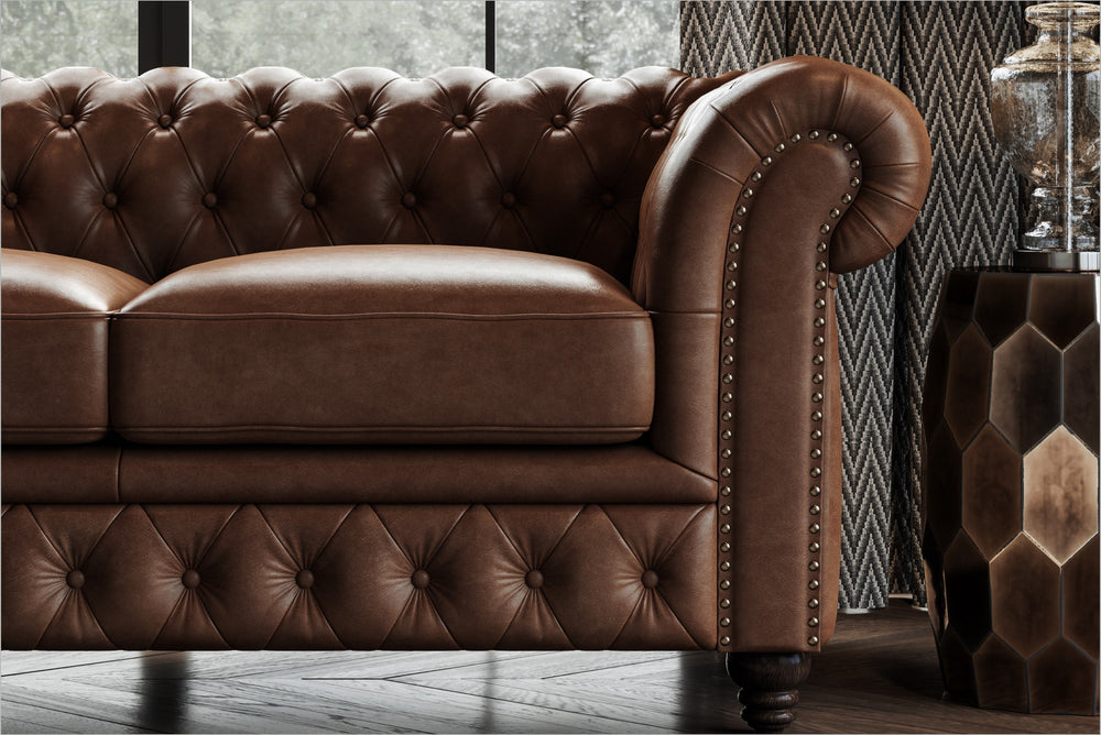 In a Living Room, There is Half Right-Side's Straight Angle Front Close-Up View of A Luxurious, Dark Chocolate, Parma 64" Top Grain Leather Chesterfield Loveseat Sofa.